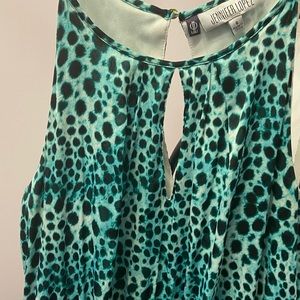 A green leopard print dress